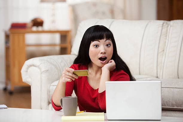 Woman Surprised Shopping Online